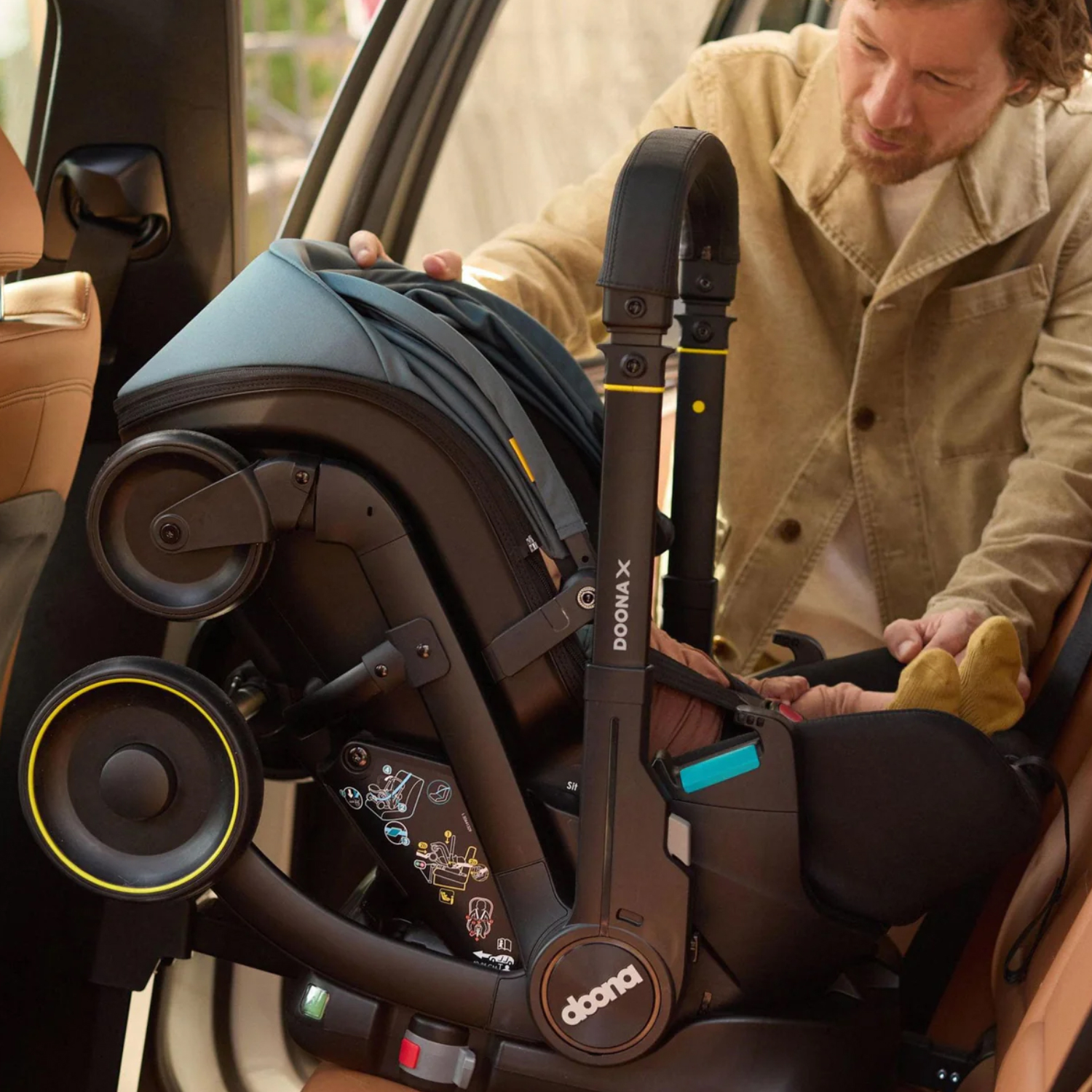 База ISOFIX для коляски-автокресла Doona X для автомобиля